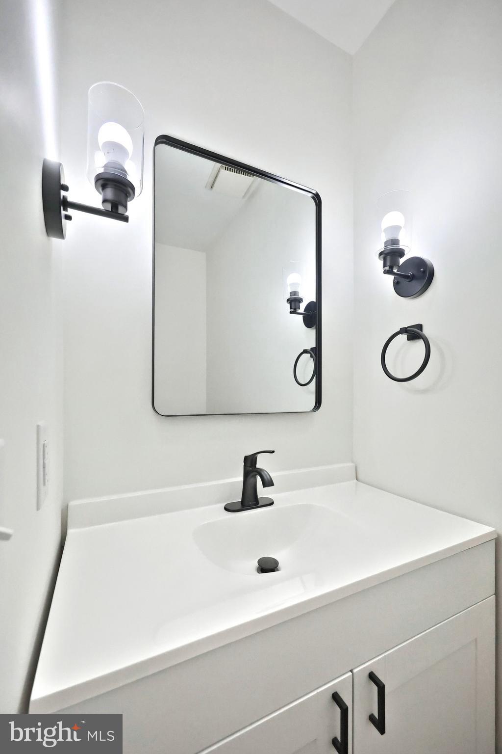 2510 Redwood Road Dover, PA 17315 - Photo 35 of 56 a bathroom with a sink and a mirror