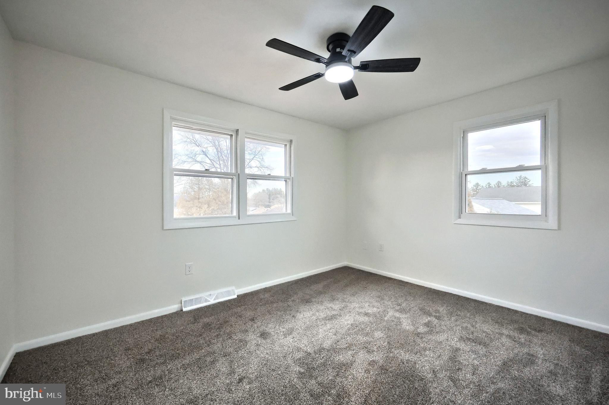 2510 Redwood Road Dover, PA 17315 - Photo 44 of 56 a view of a big room with wooden floor and windows