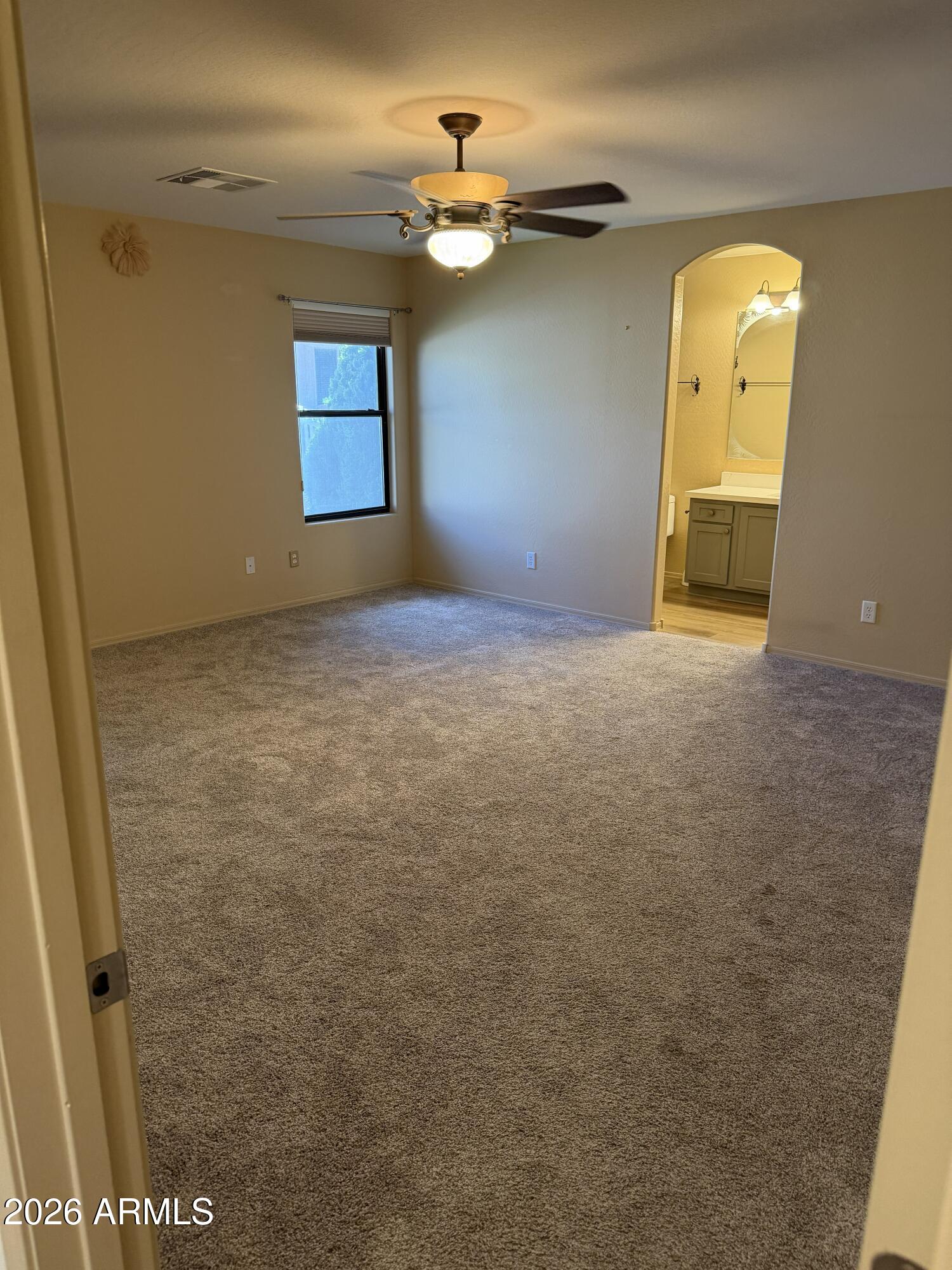2101 South Meridian Road, Unit 255 Apache Junction, AZ 85120 - Photo 11 of 24 a view of a room with a window