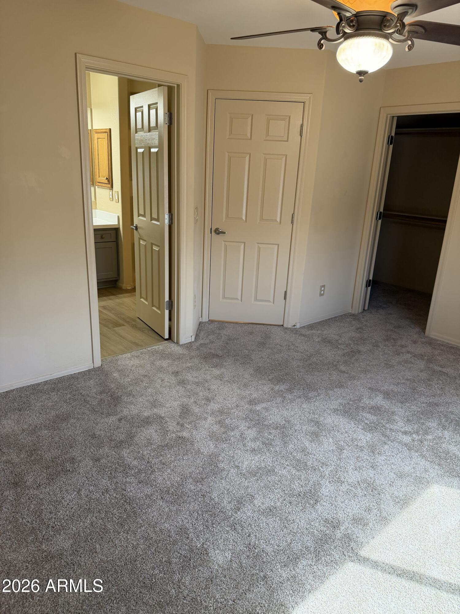 2101 South Meridian Road, Unit 255 Apache Junction, AZ 85120 - Photo 18 of 24 a view of a closet area with an empty room