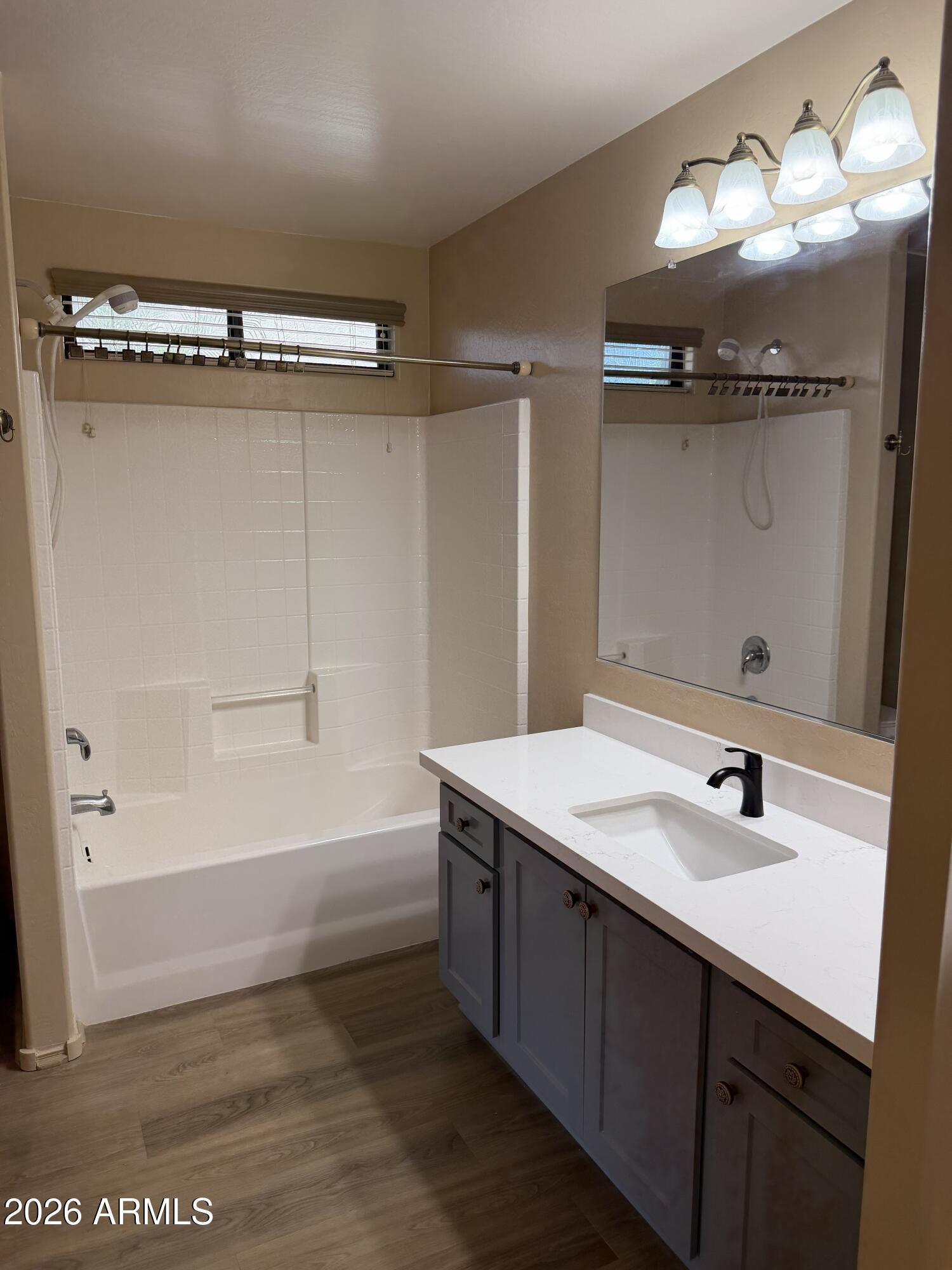 2101 South Meridian Road, Unit 255 Apache Junction, AZ 85120 - Photo 19 of 24 a bathroom with a sink and a mirror