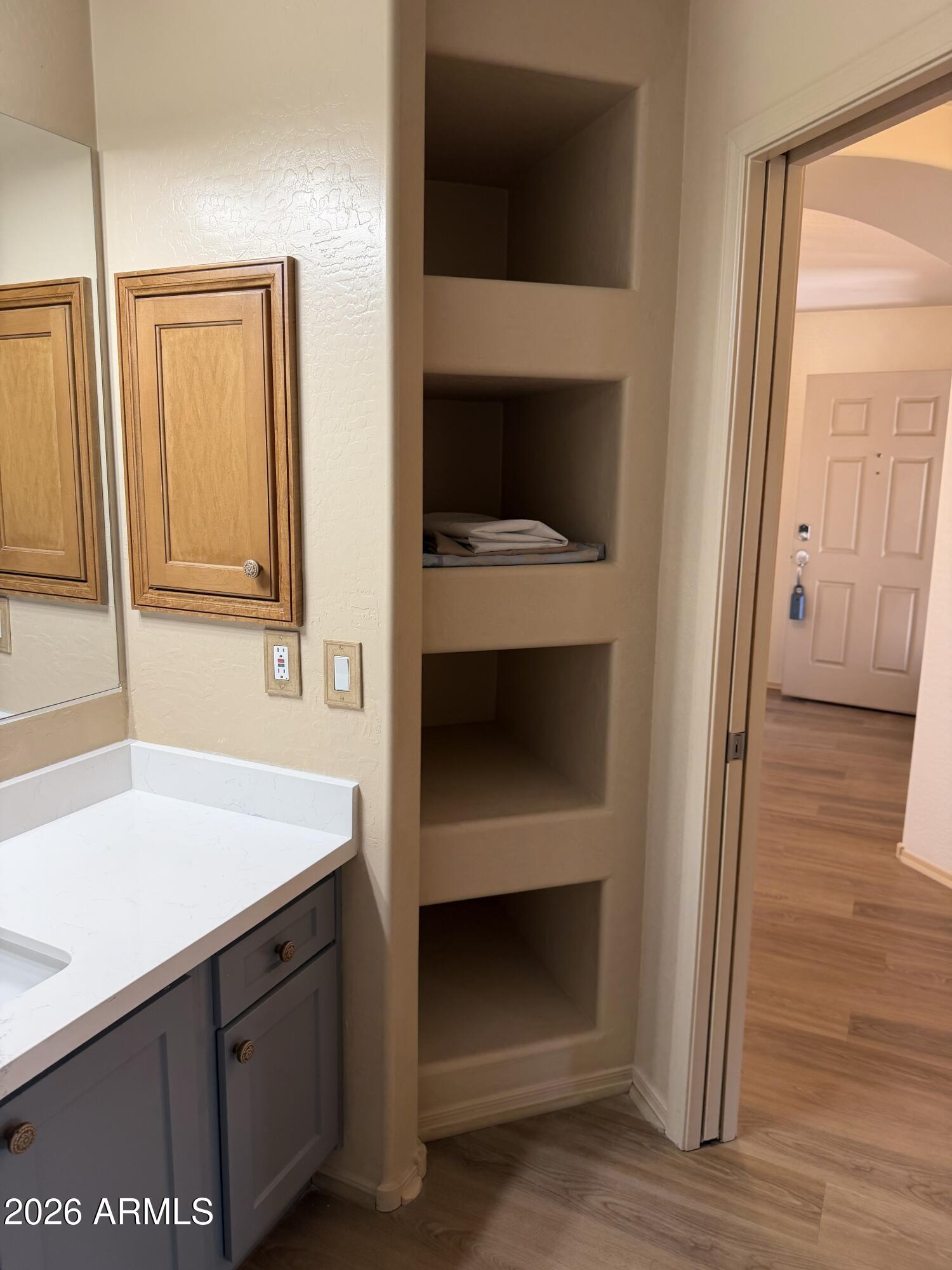 2101 South Meridian Road, Unit 255 Apache Junction, AZ 85120 - Photo 20 of 24 a hallway with washer and dryer