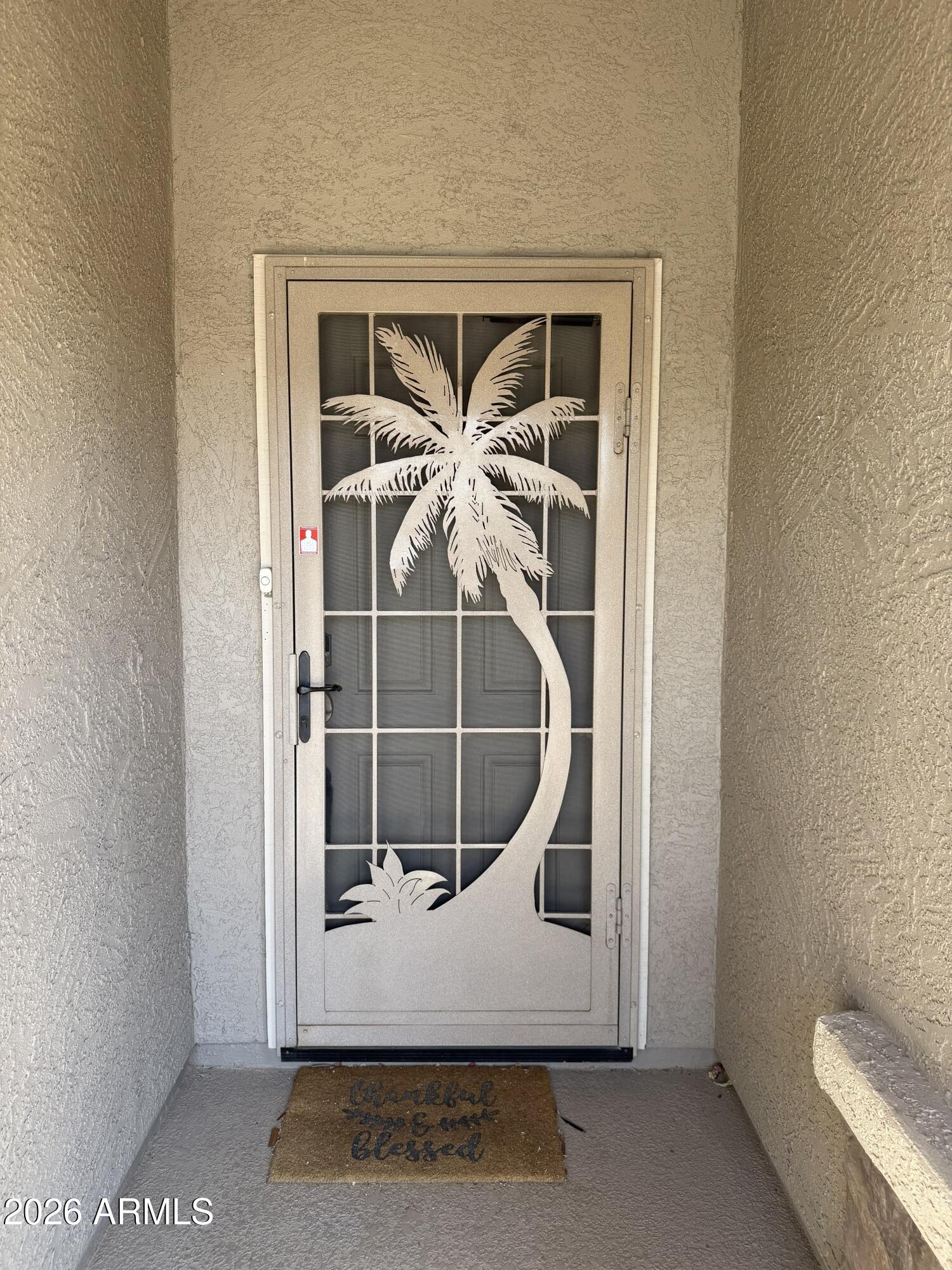 2101 South Meridian Road, Unit 255 Apache Junction, AZ 85120 - Photo 2 of 24 a room with washing machine and glass door