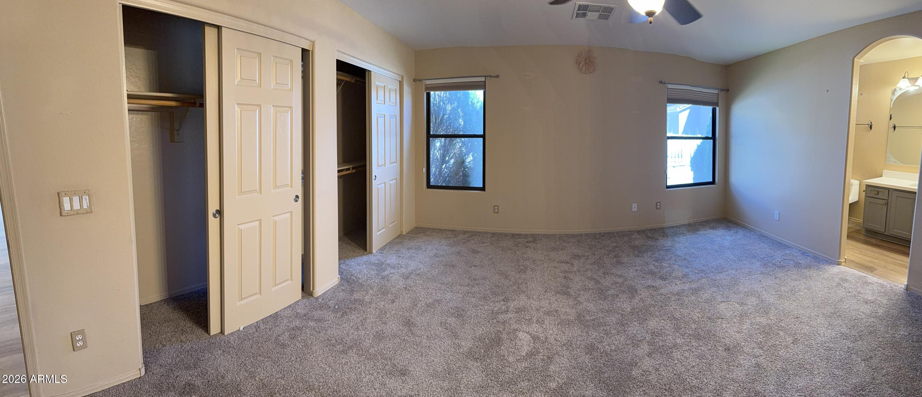 2101 South Meridian Road, Unit 255 Apache Junction, AZ 85120 - Photo 10 of 24 an empty room with windows and closet
