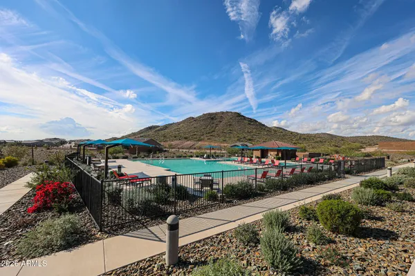 a view of a houses with sitting area