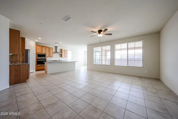 a view of a kitchen with furniture and windows