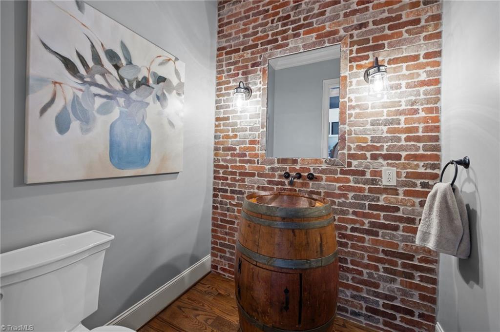 8609 Scoggins Road Oak Ridge, NC 27310 - Photo 22 of 50 Half bathroom on main