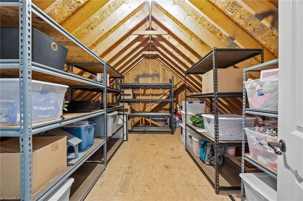 8609 Scoggins Road Oak Ridge, NC 27310 - Photo 35 of 50 Walk-in Attic
