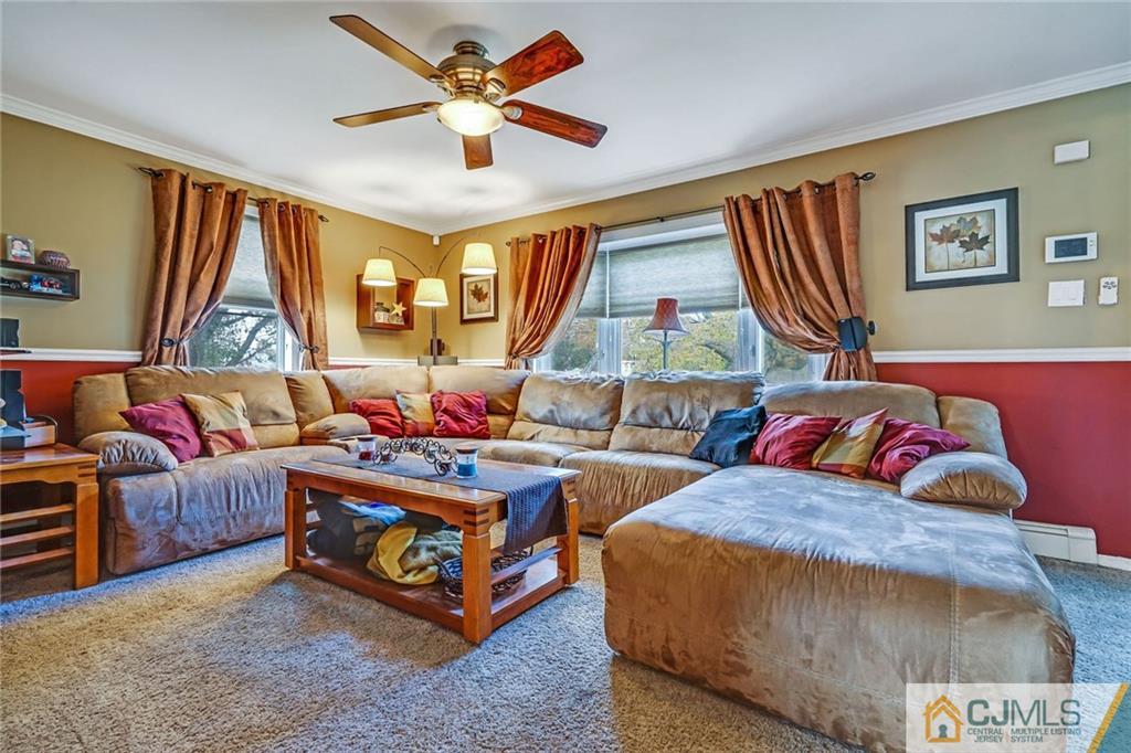 1612 Columbus Road Burlington, NJ 08016 - Photo 2 of 24 a bedroom with furniture and a large window