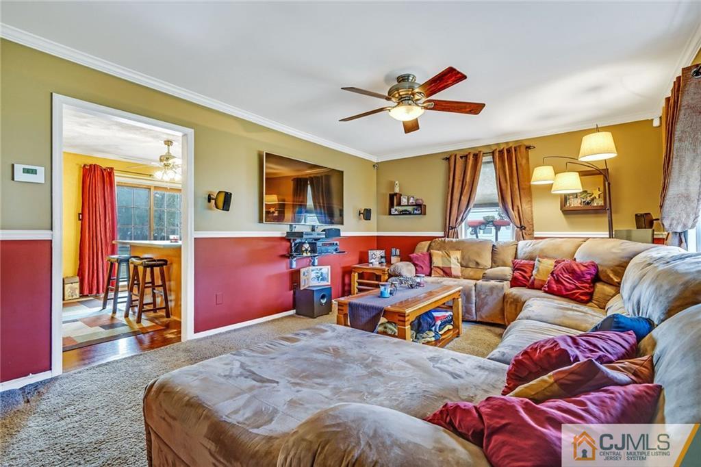 1612 Columbus Road Burlington, NJ 08016 - Photo 3 of 24 a living room with furniture and a large window