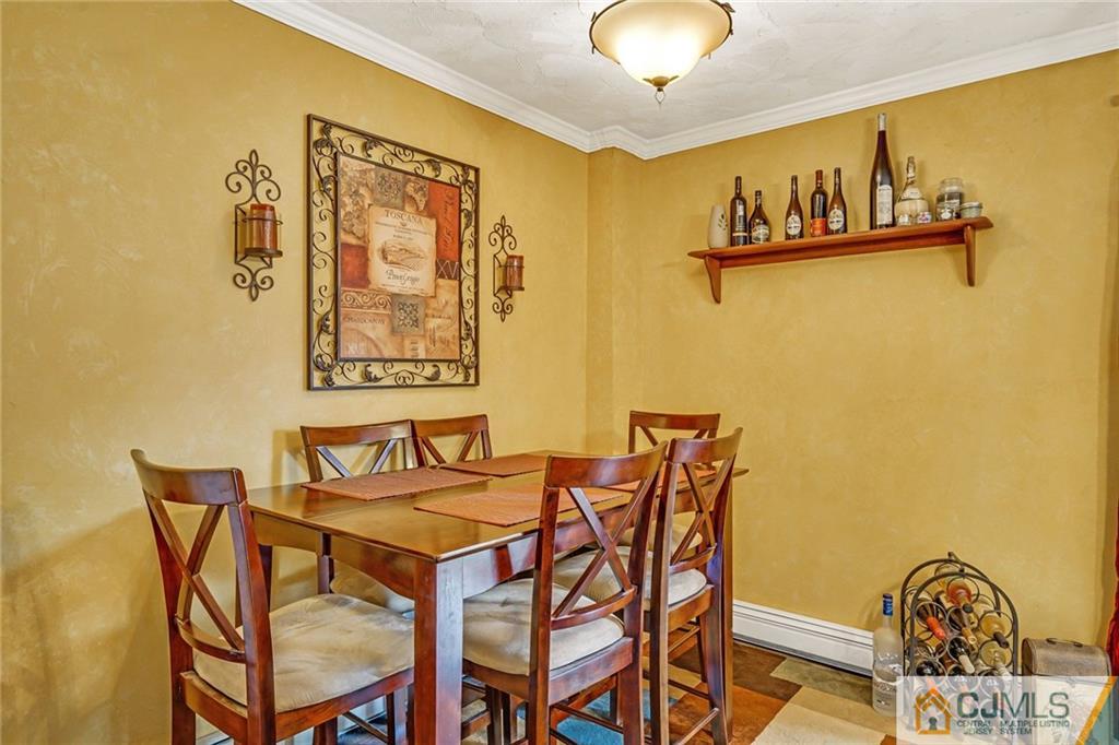 1612 Columbus Road Burlington, NJ 08016 - Photo 5 of 24 a view of a dining room with furniture and chandelier
