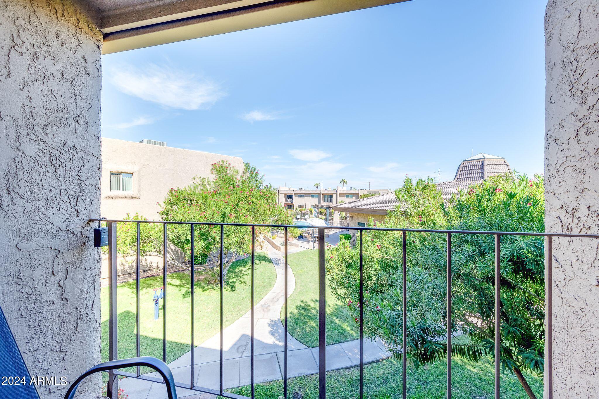 7430 East Chaparral Road, Unit 215A Scottsdale, AZ 85250 - Photo 20 of 32 Balcony Overlooking Grounds & Pool