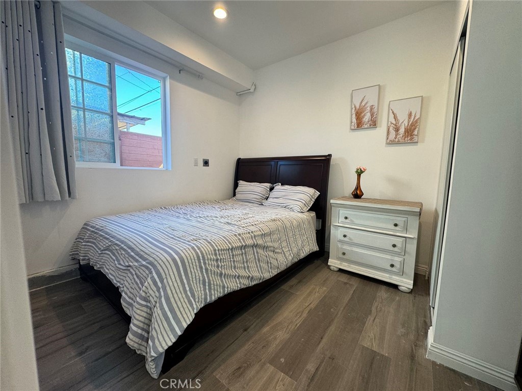 1700 South 8th Street Alhambra, CA 91803 - Photo 8 of 11 a bedroom with a bed and a dresser