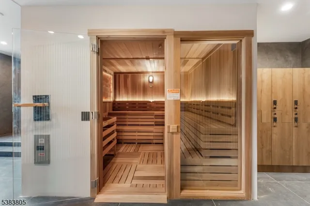 a view of a bathroom with a shower and a sink
