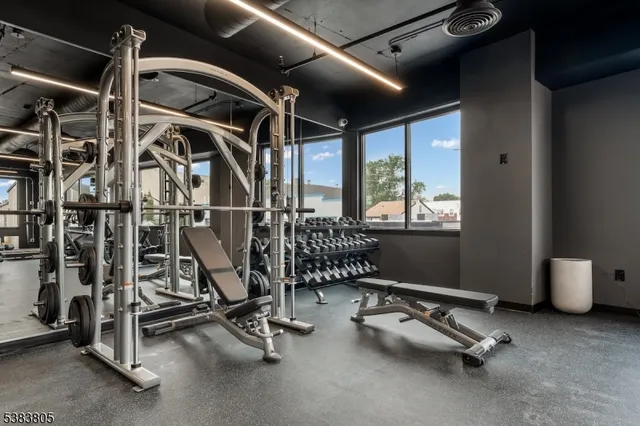 a view of a livingroom with furniture and a window