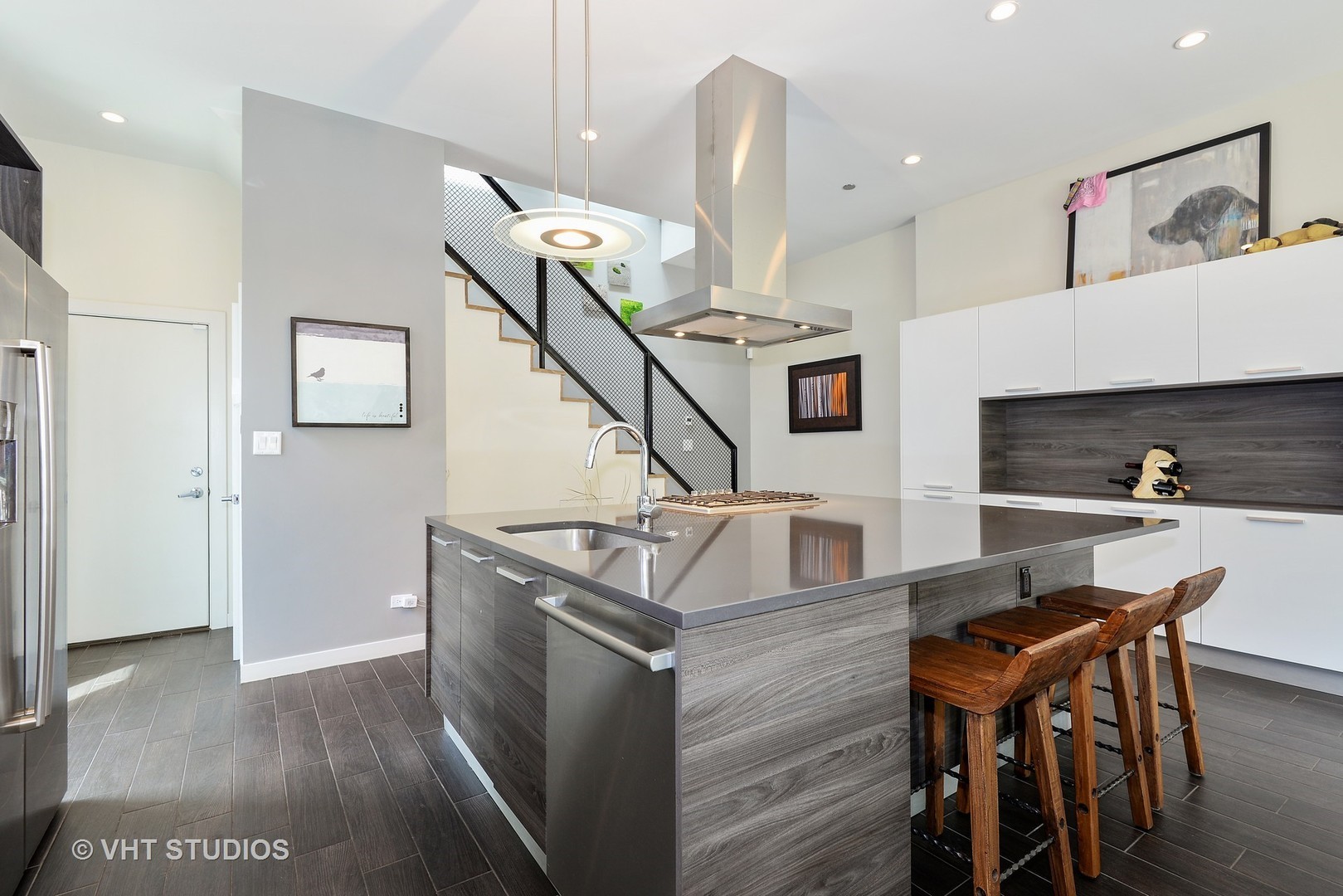 4832 North Clark Street, Unit 101 Chicago, IL 60640 - Photo 7 of 22 a living room with furniture and wooden floor