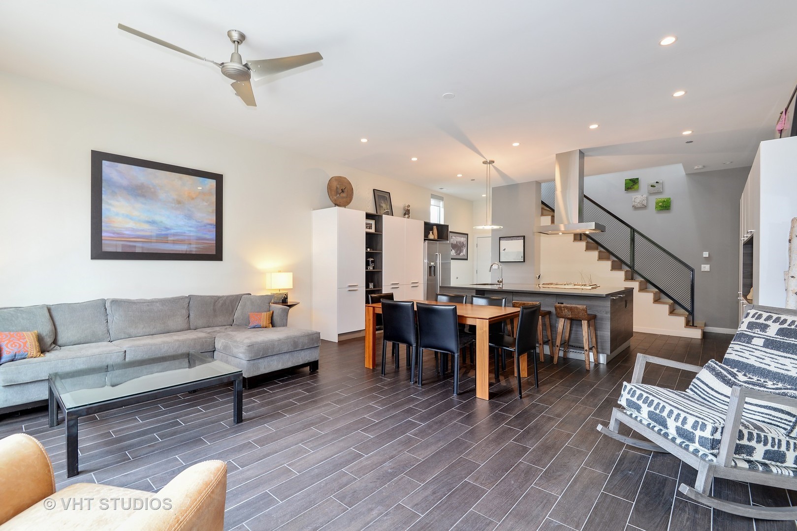 4832 North Clark Street, Unit 101 Chicago, IL 60640 - Photo 8 of 22 a living room with furniture and wooden floor