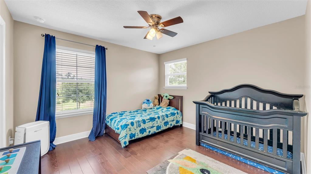 132 Magneta Loop Auburndale, FL 33823 - Photo 40 of 56 a bedroom with furniture and a window