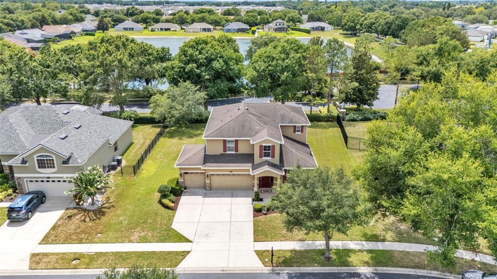 132 Magneta Loop Auburndale, FL 33823 - Photo 4 of 56 an aerial view of a house with a yard basket ball court and outdoor seating