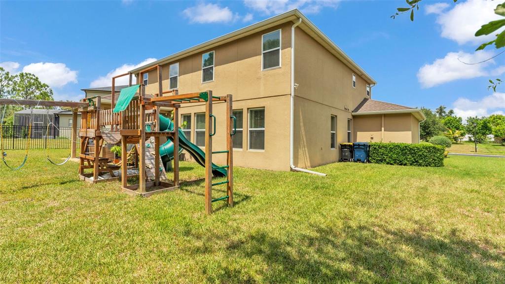 132 Magneta Loop Auburndale, FL 33823 - Photo 43 of 56 a view of a house with a park