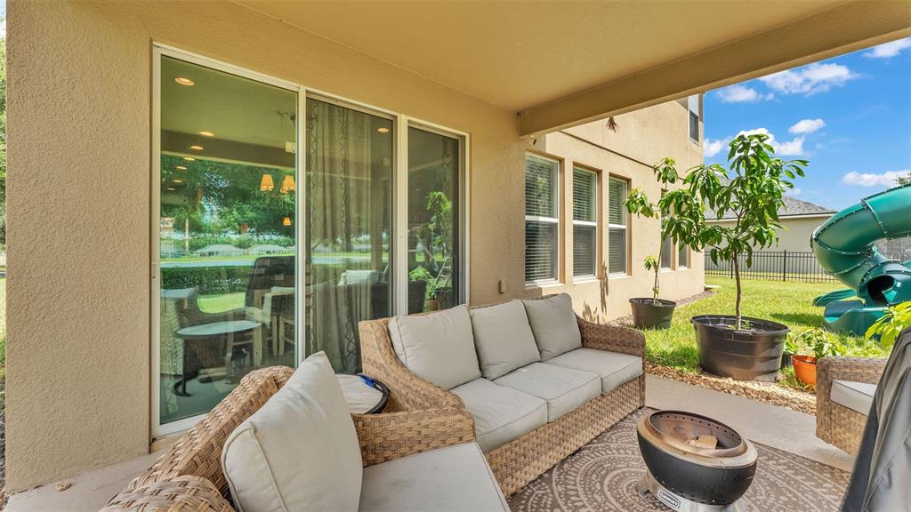 132 Magneta Loop Auburndale, FL 33823 - Photo 44 of 56 a living room with furniture and a potted plant
