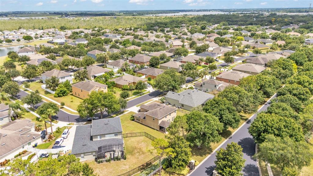 132 Magneta Loop Auburndale, FL 33823 - Photo 46 of 56 an aerial view of residential houses with outdoor space