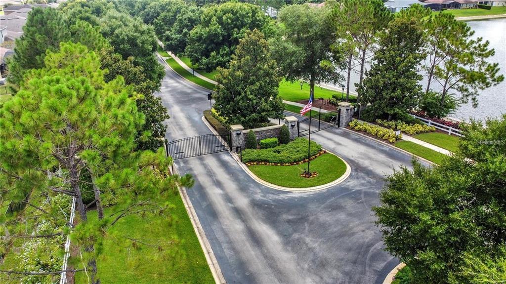 132 Magneta Loop Auburndale, FL 33823 - Photo 52 of 56 a view of a garden with swimming pool