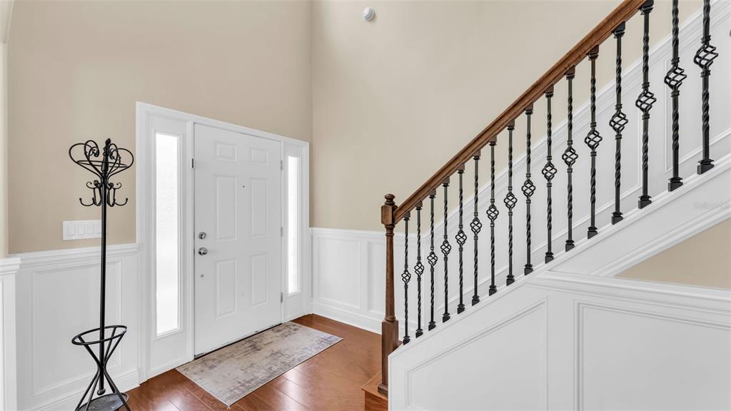 132 Magneta Loop Auburndale, FL 33823 - Photo 6 of 56 a view of an entryway with wooden floor