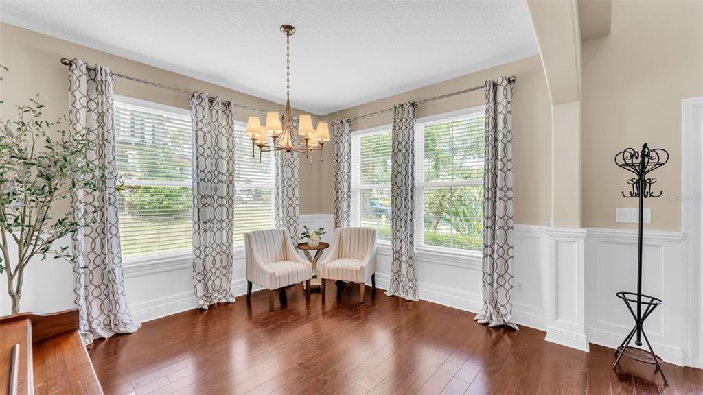 132 Magneta Loop Auburndale, FL 33823 - Photo 7 of 56 a living room with furniture and a window