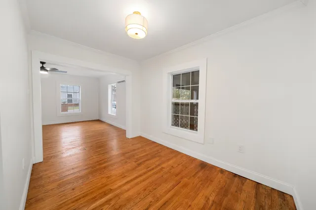 a kitchen with cabinets and stainless steel appliances