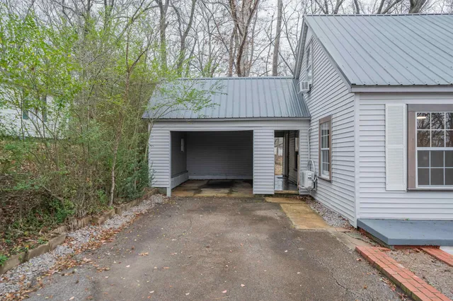 a backyard of a house with lots of green space