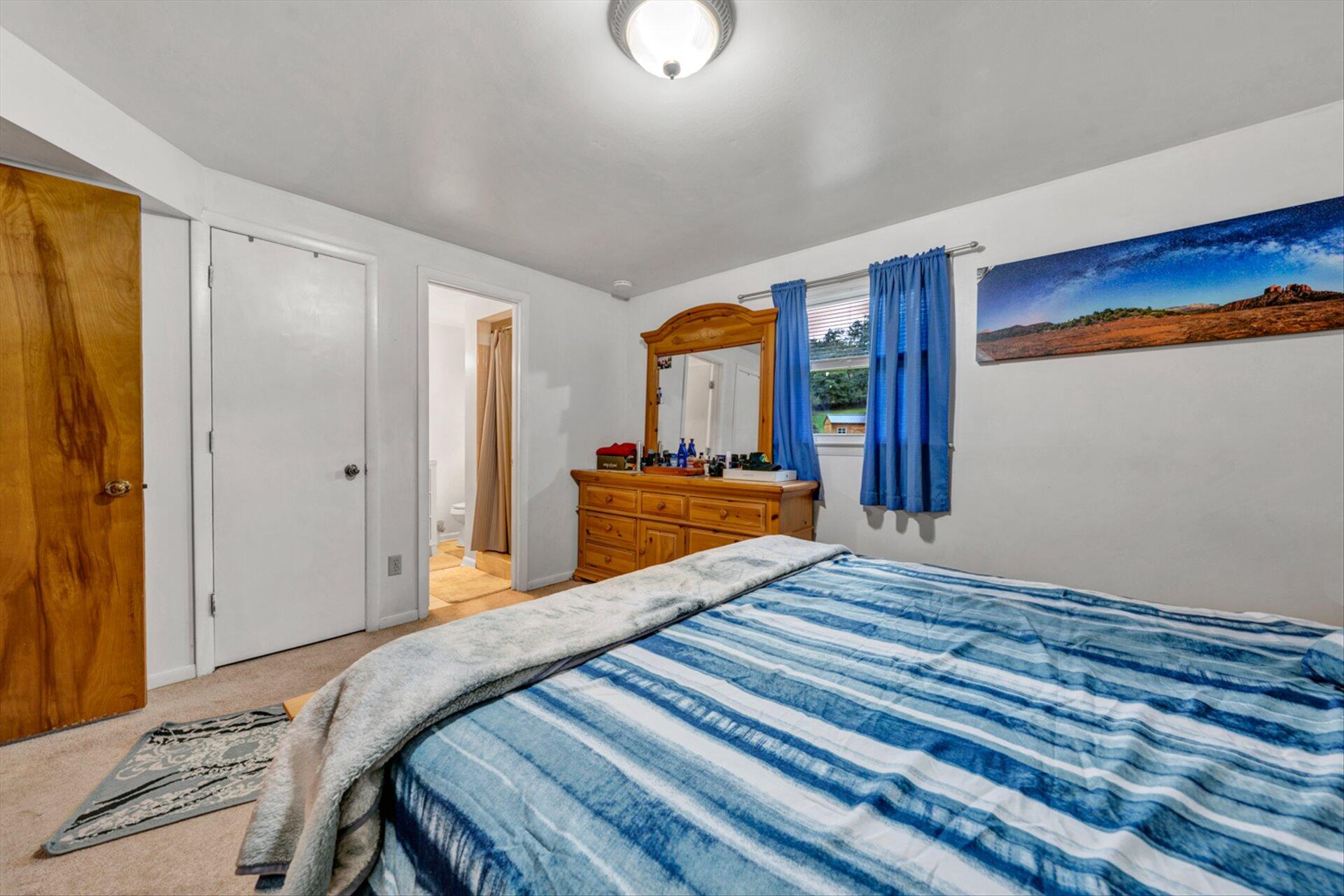 3131 Galloway Drive Roanoke, VA 24018 - Photo 20 of 37 a bedroom with a bed and a dresser