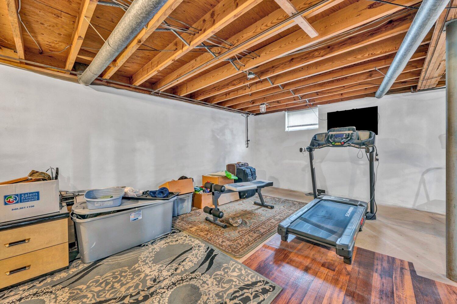 3131 Galloway Drive Roanoke, VA 24018 - Photo 23 of 37 a living room with furniture and a wooden floor