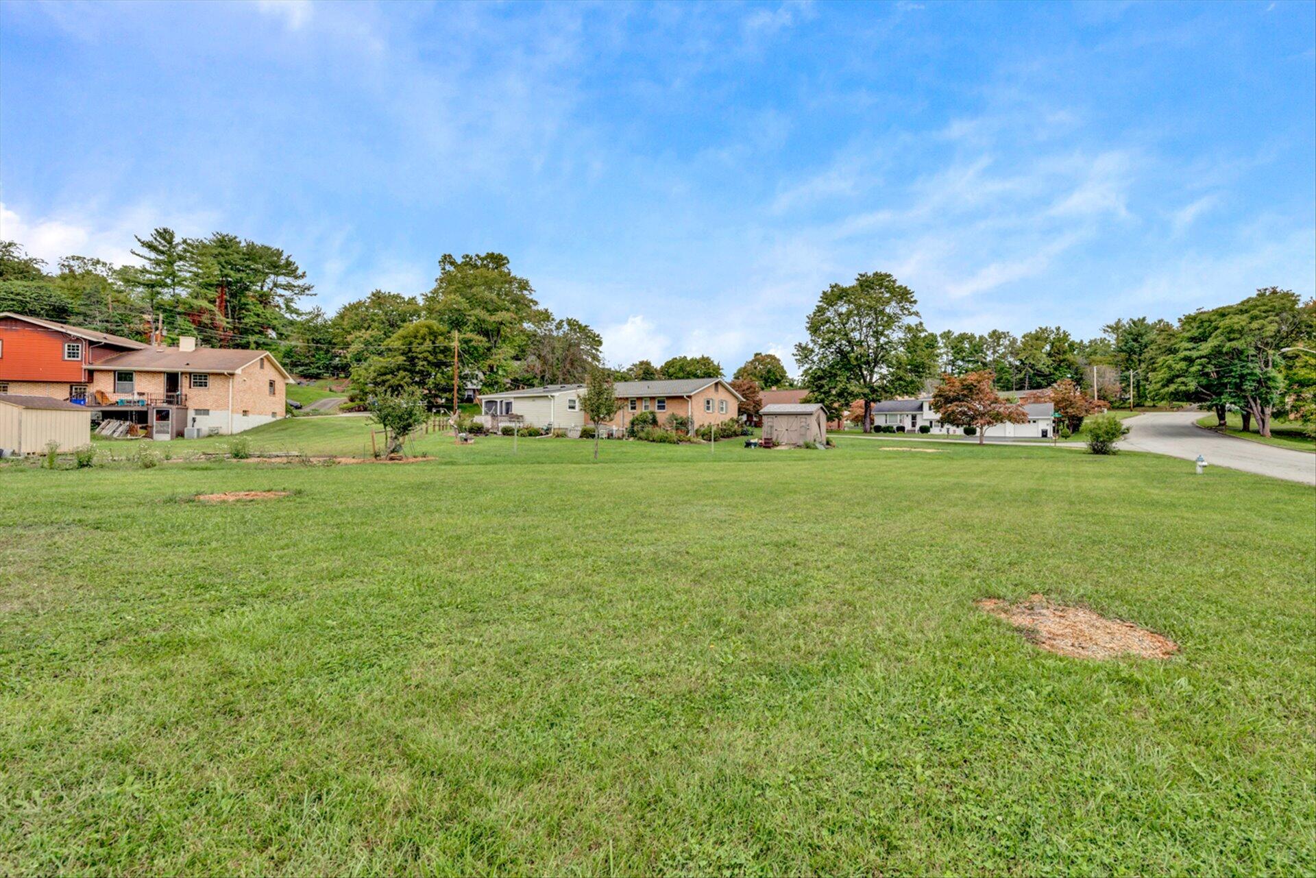 3131 Galloway Drive Roanoke, VA 24018 - Photo 35 of 37 a view of a field of grass and trees