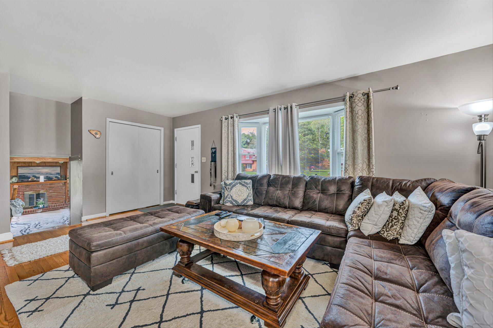 3131 Galloway Drive Roanoke, VA 24018 - Photo 6 of 37 a living room with furniture and a large window