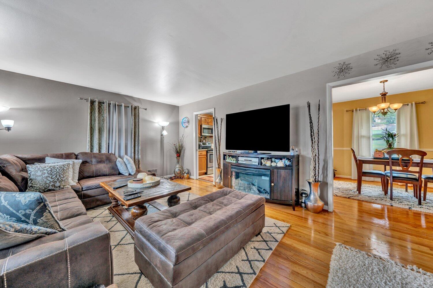 3131 Galloway Drive Roanoke, VA 24018 - Photo 7 of 37 a living room with furniture and a flat screen tv