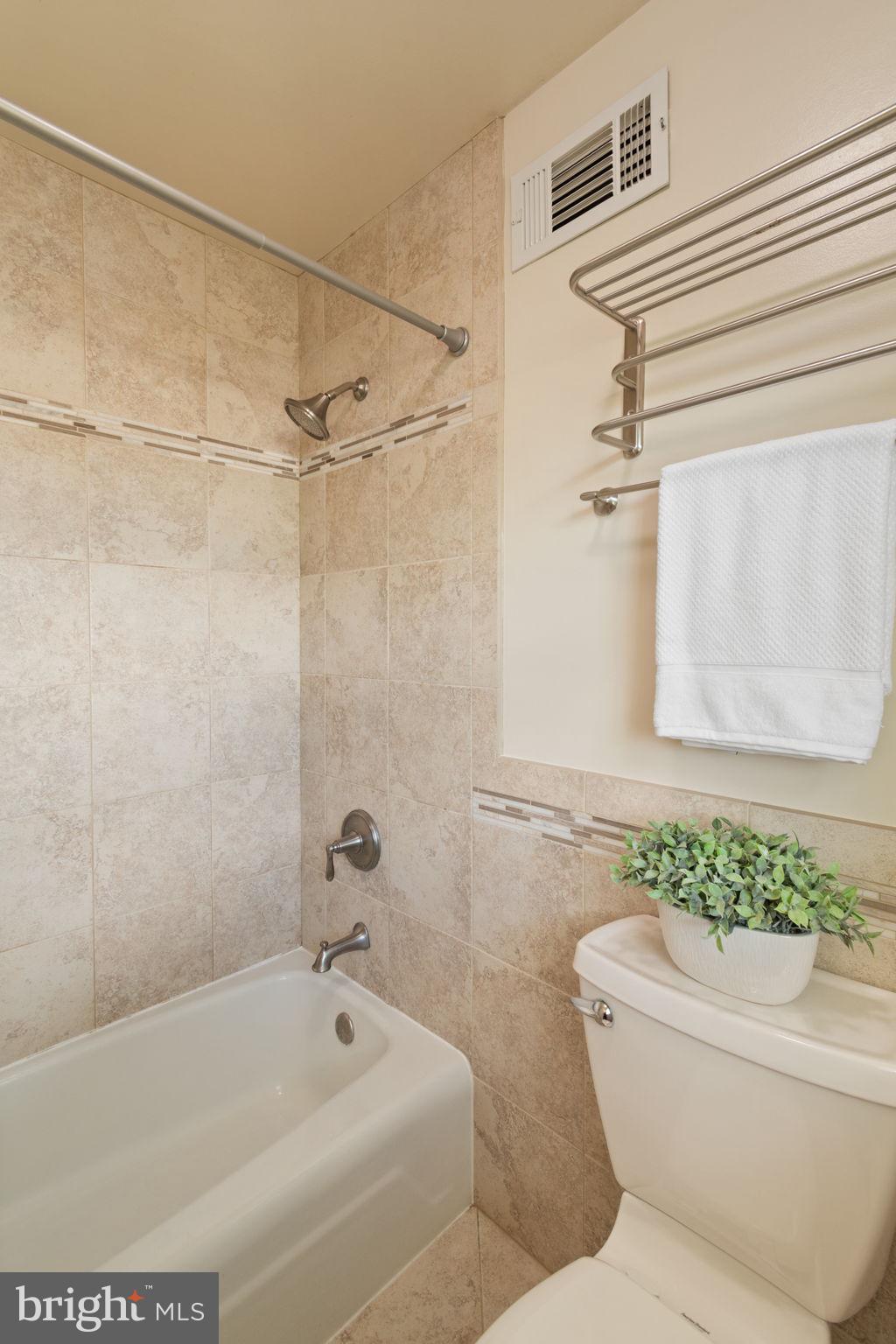 7619 Hayfield Road Alexandria, VA 22315 - Photo 32 of 60 Primary bath with gorgeous tile
