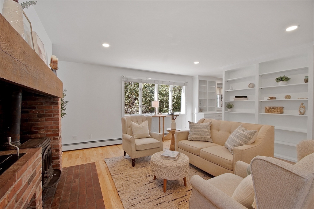 75 Westcott Road Harvard, MA 01451 - Photo 22 of 32 a living room with furniture and a flat screen tv