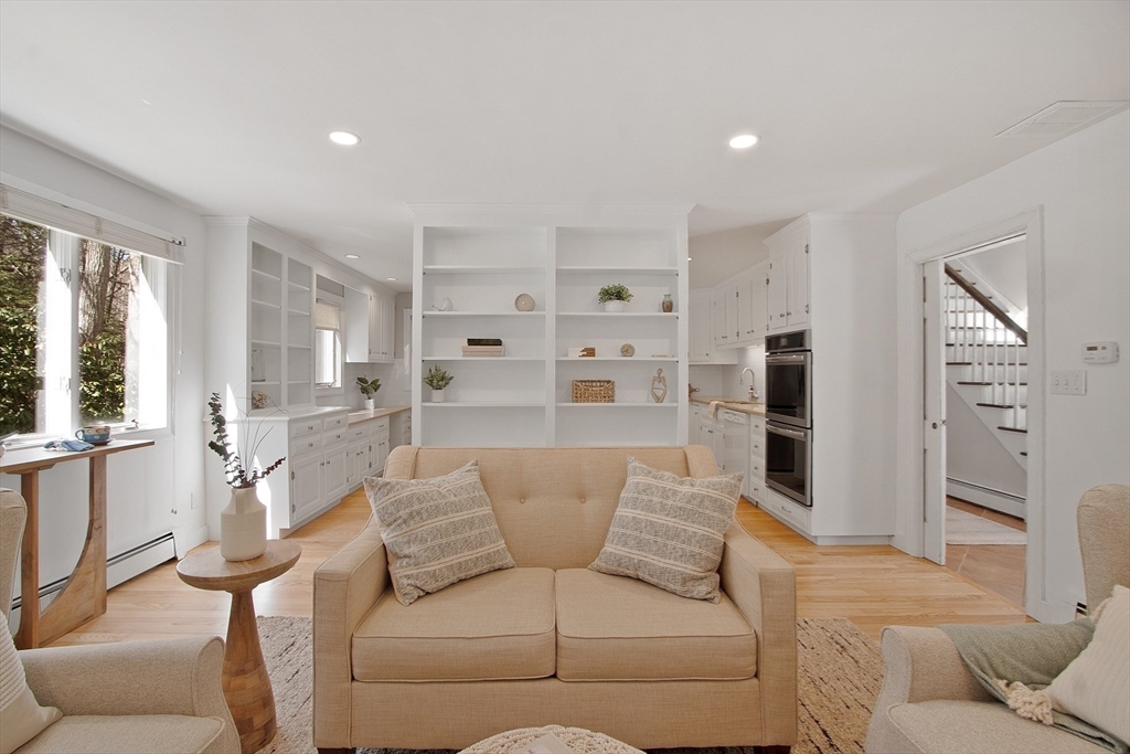 75 Westcott Road Harvard, MA 01451 - Photo 23 of 32 a living room with furniture and a rug