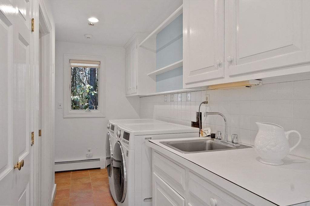 75 Westcott Road Harvard, MA 01451 - Photo 25 of 32 a bathroom with a sink and a washing machine