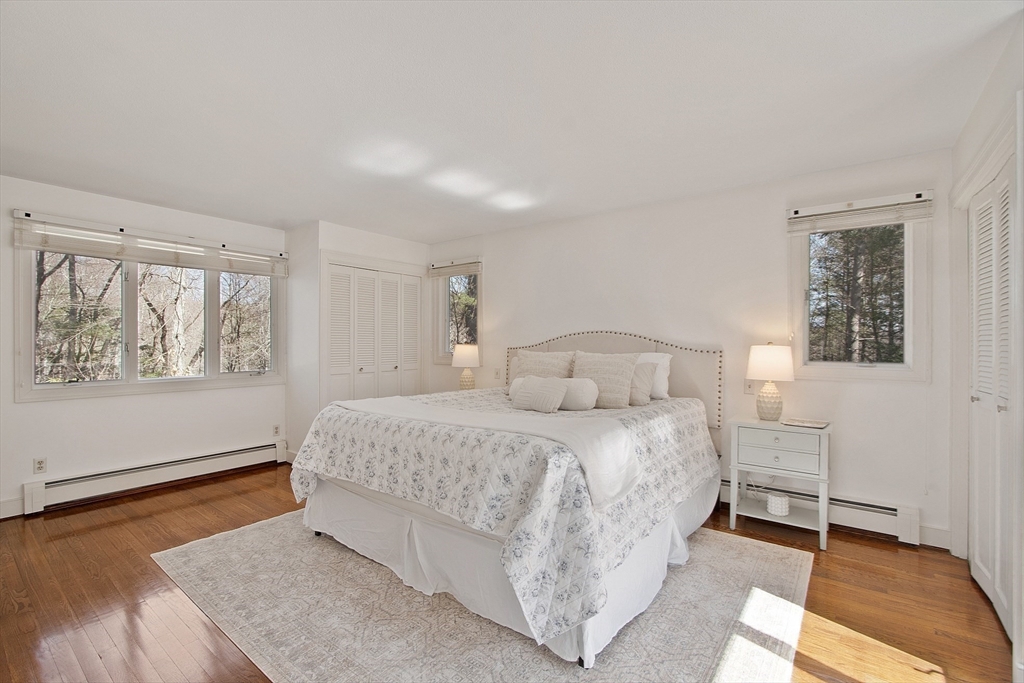 75 Westcott Road Harvard, MA 01451 - Photo 8 of 32 a bedroom with a bed and a window