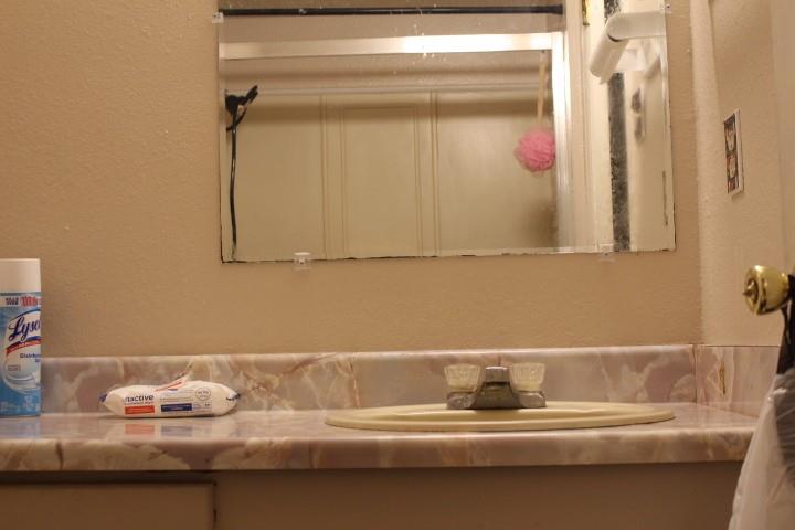538 Massey Street Athens, TX 75751 - Photo 17 of 32 a bathroom with a sink and a mirror