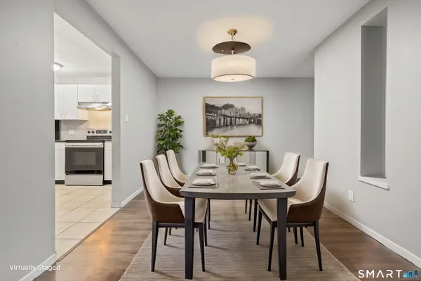 a view of a dining room with furniture