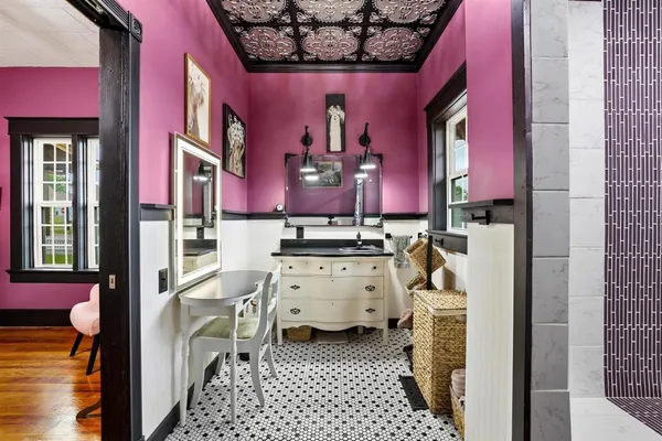 a bathroom with a sink and a mirror