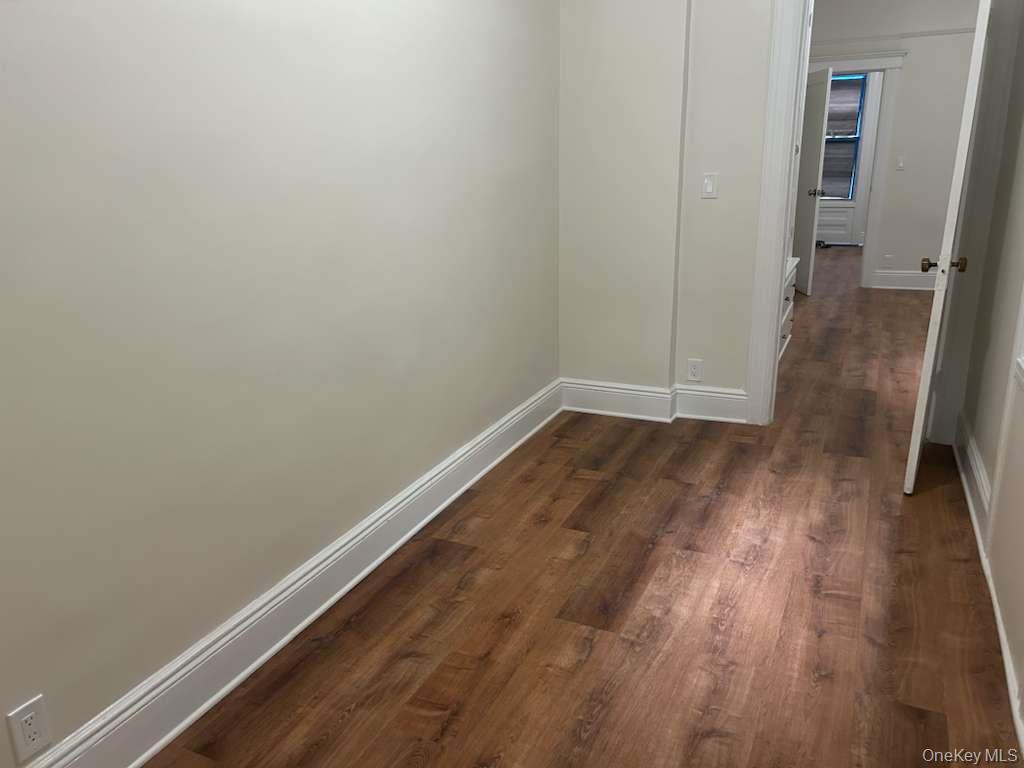 88-23 85th Street, Unit 1L Queens, NY 11421 - Photo 10 of 17 a view of small space with wooden floor