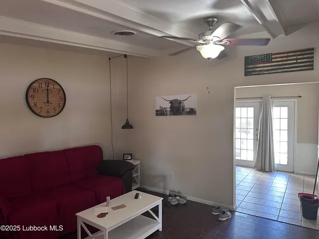 a view of a livingroom with furniture and wooden floor