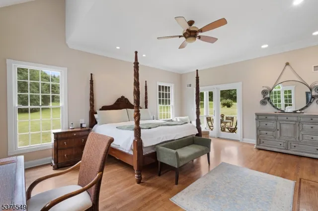 a bed room with furniture and a window