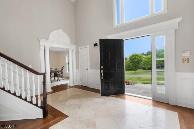 a view of livingroom with furniture and floor to ceiling window