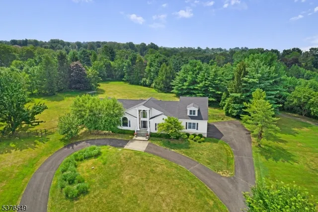 a view of a house with a big yard
