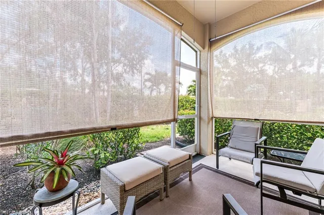 a front view of a house with garden and yard